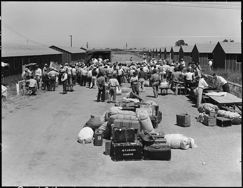 Stockton, California. The first day at an assembly center. A new unit of the barracks is being ope . . . - NARA - 537734